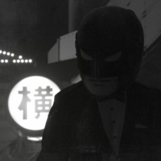 J.